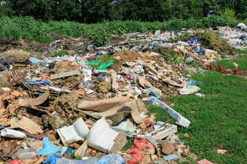 View of the landfill. Landfill A pile of plastic garbage, food waste and other garbage. Pollution...