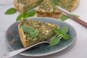 Quiche with spinach - traditional dish of french cuisine