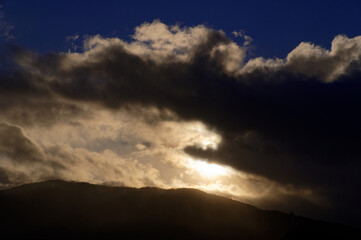 Clouds block out the light from the sun creating a moody sky