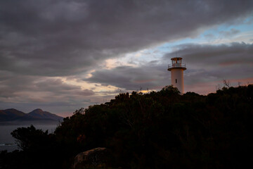 white lighthouse at the freycinet national park Tasmania Australia