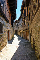 Fototapeta na wymiar Narrow cobbled streets of, La Alberca, a small town in Spain. It was the first Spanish town declared a Historic-Artistic Site, in 1940.