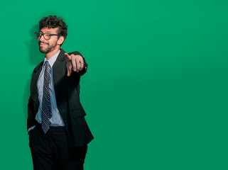 Young businessman with positive attitude pointing at me, Friendly smiling business man pointing at...