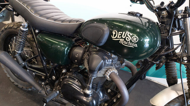 Deus logo brand and paint sign text brand on custom motorcycle in w 650 Kawasaki fuel tank petrol motorbike