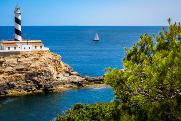 Panorama view of the Mallorca Cala Figuera lighthouse on a peninsula with an idyllic cove and a...