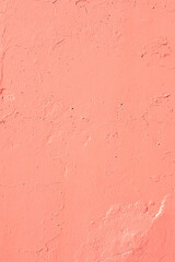 Fototapeta premium Closeup of saturated solid pink urban wall concrete texture. Modern pattern for wallpaper design. Creative modern urban city background for advertising mockups. Minimal monochrome style trendy color