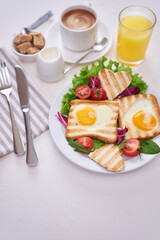 Heart shaped Fried Egg on Toast Bread and cup of fresh hot espresso coffee