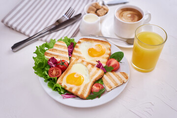 Heart shaped Fried Egg on Toast Bread and cup of fresh hot espresso coffee