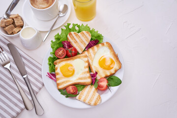 Heart shaped Fried Egg on Toast Bread and cup of fresh hot espresso coffee