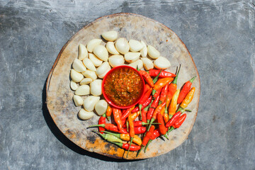 Indonesian garlic chilli sambal or sambel bawang with garlic, chilli and salt as Ingredients. authentic traditional sambal or chilli paste from indonesia.