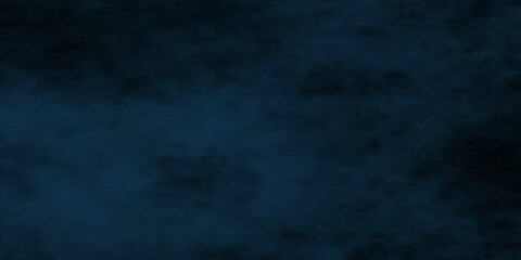Abstract Blue background with clouds,  dark blue grunge texture with grainy stains, Blue grunge with smoky stains and vintage grunge.