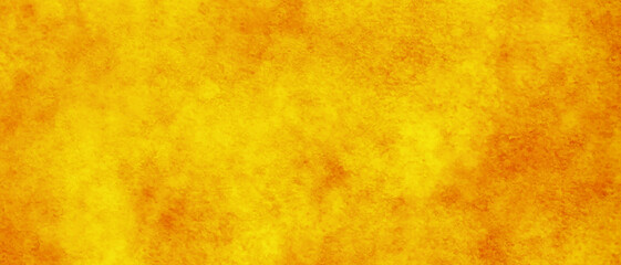 Abstract shinny and soft orange or yellow background texture with grainy stains, bright and shinny yellow or orange watercolor shades grunge background with space for your text.