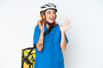 Young caucasian woman with thermal backpack isolated on white background with surprise facial expression