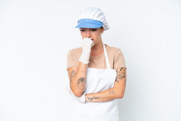 Fishmonger wearing an apron and holding a raw fish isolated on white background having doubts