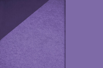 Textured and plain blue purple sheet papers forming two triangles and vertical blank rectangle for creative cover designing