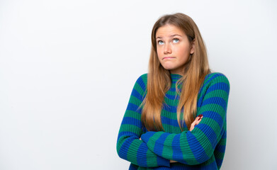 Young caucasian woman isolated on white background making doubts gesture while lifting the shoulders