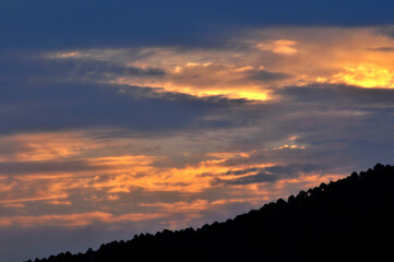 sunset over the clouds