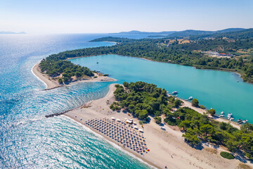 scenic drone shot of stunning Glarokavos Beach in Kassandra peninsula, Halkidiki, Greece. High...