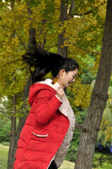 Chinese girl is playing at park