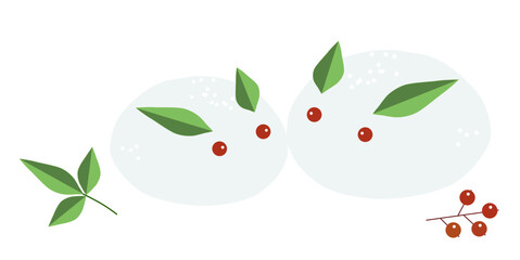 雪とナンテンの実と葉で作った2羽の雪ウサギ