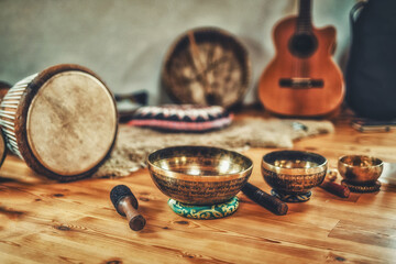 A still life of the shamanic drum and tibetan singing bowls.