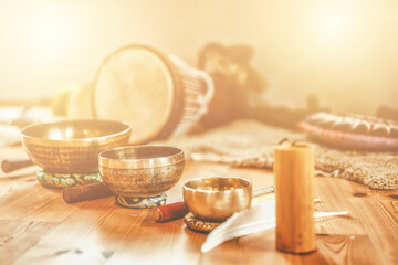 A still life of the shamanic drum and tibetan singing bowls.