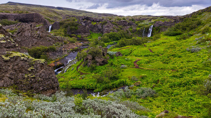 Drone view at the waterfalls of Gjain in Iceland