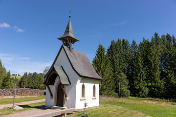 Fototapeta na wymiar White little chapel in the Black Forest. Germany