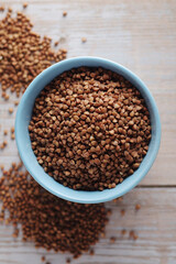 Buckwheat grain in a small ceramic bowl