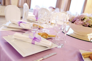 Detail of a table set in pink for a wedding banquet