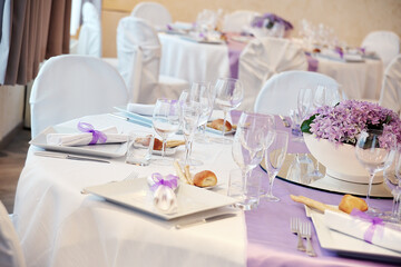 Detail of a table set in pink for a wedding banquet