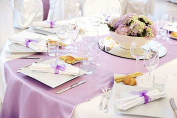 Detail of a table set in pink for a wedding banquet