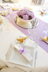 Detail of a table set in pink for a wedding banquet