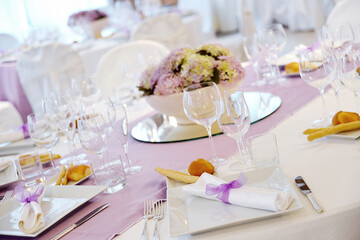 Detail of a table set in pink for a wedding banquet