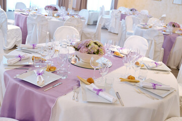 Detail of a table set in pink for a wedding banquet