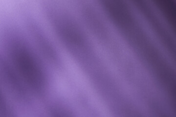 Fototapeta na wymiar Illuminated light with gobo mask on purple background.