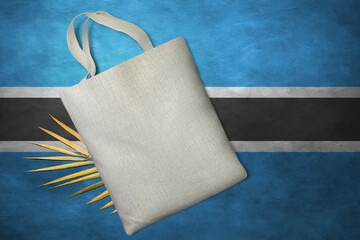 Patriotic tote bag mock up on background in colors of national flag. Botswana