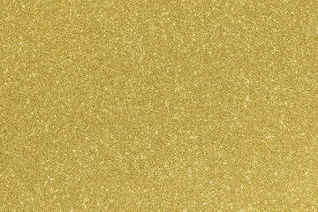 Shiny and sparkling gold colored glitter background.