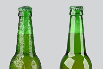 cold green beer bottle with water drops