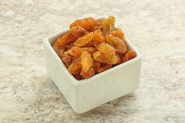 Sweet yellow raisin in the bowl