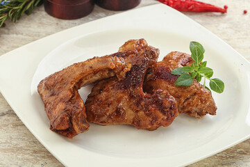 Roasted chicken wings with spicy sauce