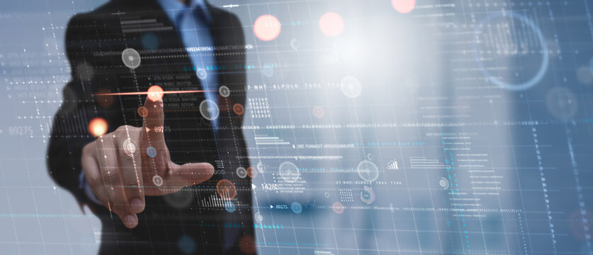 Data science. Business intelligence concept. Businessman touching on virtual screen with big data, futuristic computer dashboard, database, Algorithm, deep learning of artificial intelligence