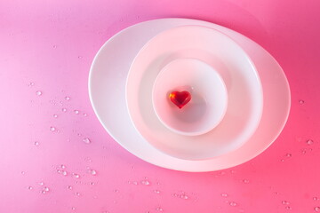 red glass heart in three plates tableware banner, cover, website hat, for cafe couples in love