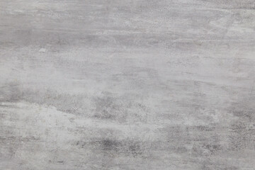 concrete grey wall texture may used as background. The heterogeneous texture of gray color is...