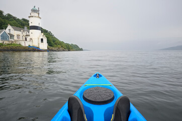 Cloch Lighthouse and blue kayak on open water at Firth of Clyde