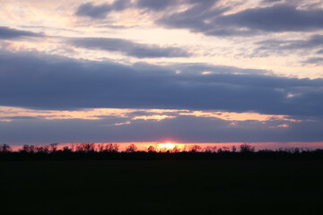 Picturesque view of beautiful countryside at sunset