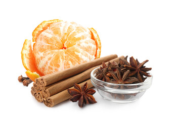 Fresh ripe tangerine, cloves, anises and cinnamon on white background