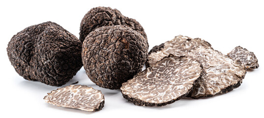 Black winter truffles and truffle slices on white background. The most famous of the trufflez. - obrazy, fototapety, plakaty