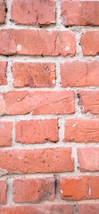 Old brickwork background, brick red wall texture, structure.  Part of a stone wall, for background or texture.