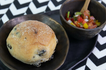 close up Tomato and Olive roll wheat Bread Roll with liver pate