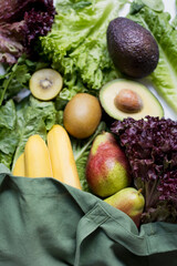 Fruits and green salad shopping bag